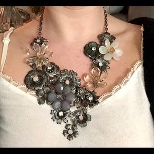 Silver and jeweled adorned costume necklace